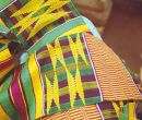Detail of Gilbert's kente, a traditional Ashanti design called Ohene Afro Hyen: "the King has boarded a ship," featuring the golden Ashanti stool.